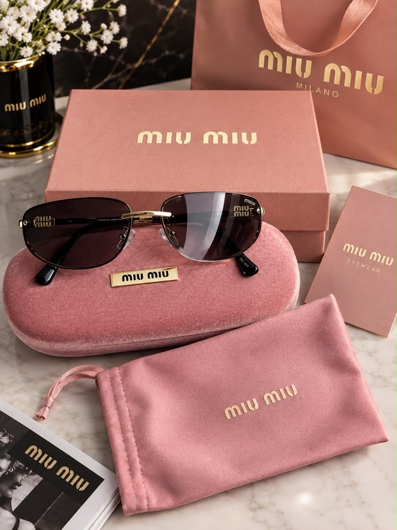 Miu Miu Style Rimless Sunglasses